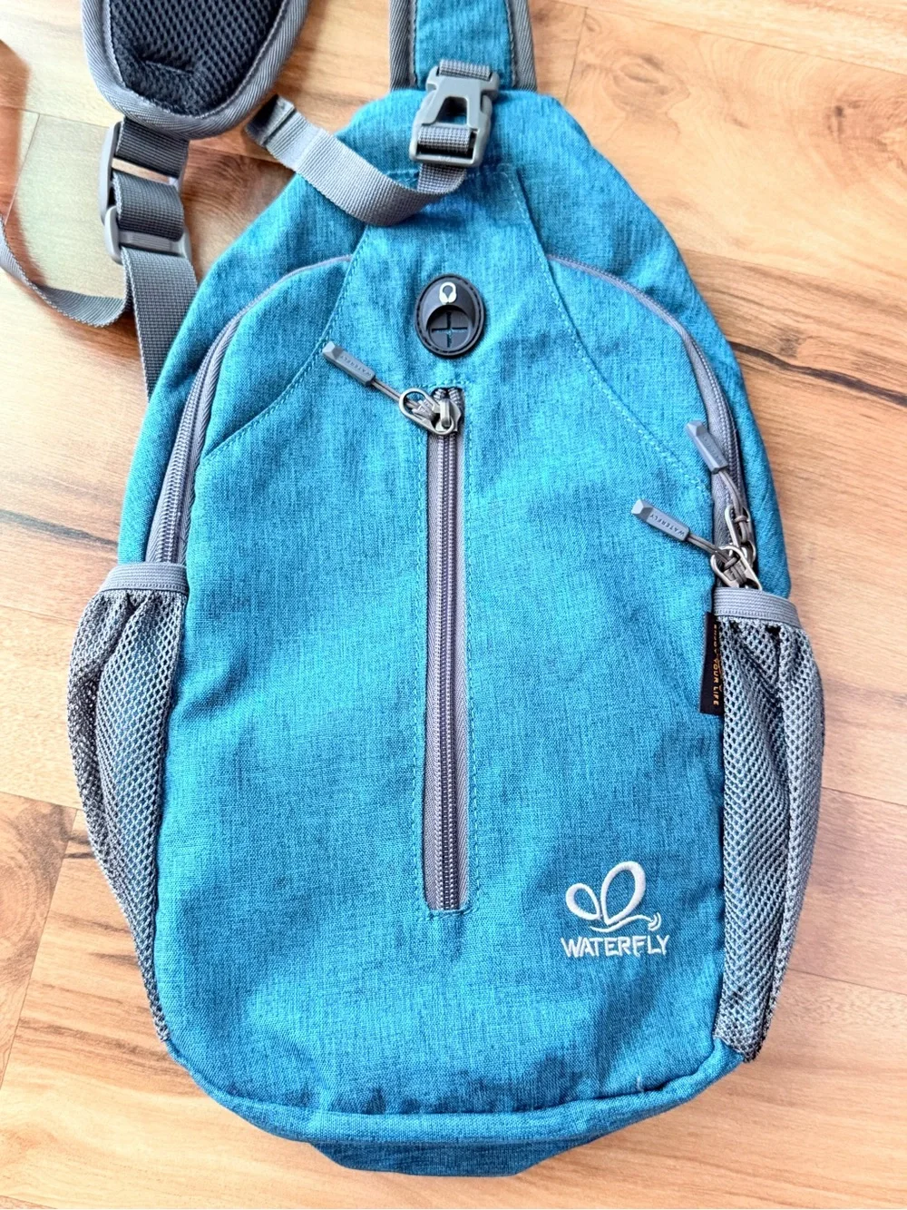 WATERFLY Sling Backpack Teal Crossbody Chest Bag Travel Hiking Daypack Unisex